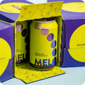 an opened box of melo with a can showing